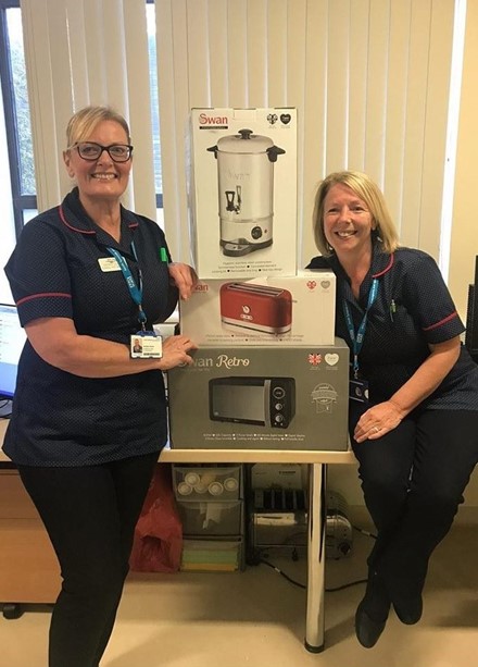 NHS staff with swan products
