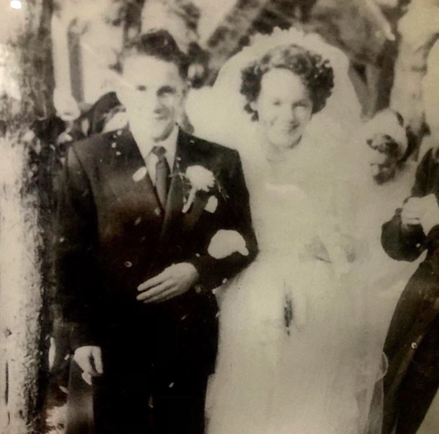 Old black and white photograph of pat and john on their wedding day