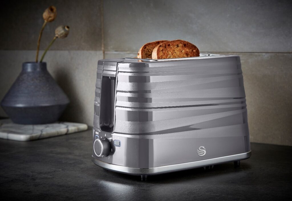 Photograph of Swan Symphony Grey toaster on a black countertop