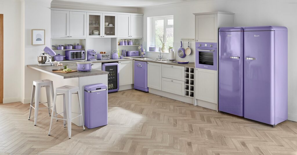Photograph of a kitchen with lots of purple appliances