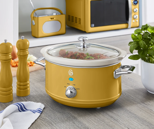 Image of the Swan 3.5L Retro Slow Cooker with the salt & pepper shakers