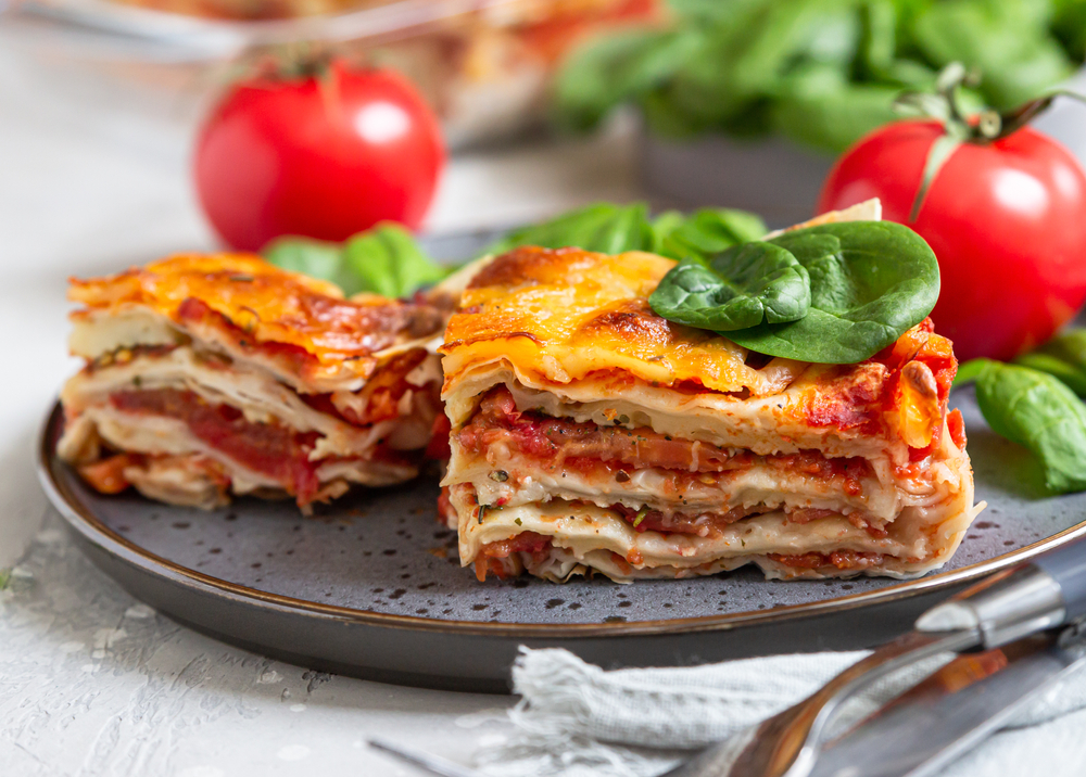 Colour image of two slices of vegan lasagne