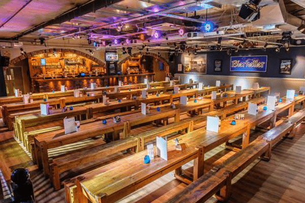 Wooden tables inside the Bierkeller at Liverpool