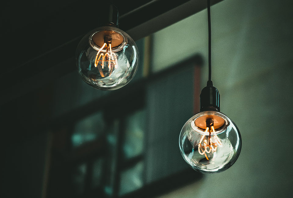 Close-up of Scandinavian style hanging lightbulbs