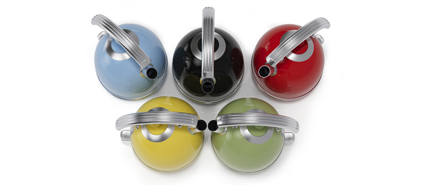 Image of 5 coloured Swan Retro Dome Kettles positioned to look like the Olympics logo. From top to bottom and left to right the kettles are blue, black, red, yellow, and green. 