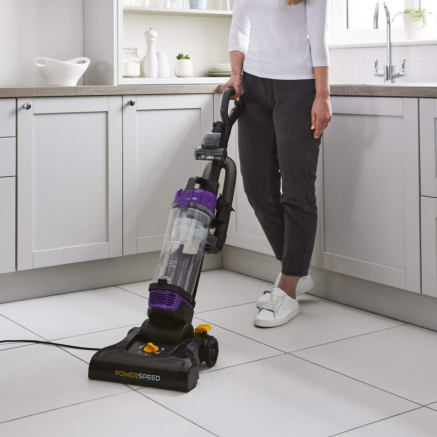 A person using the Swan Powerspeed vacuum. 