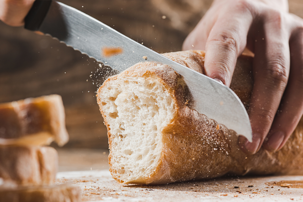 Slicing bread with a bread knife
