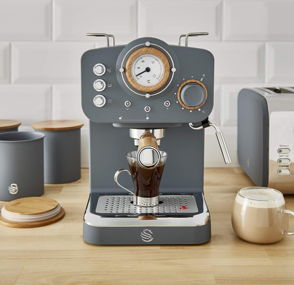 Grey nordic coffee machine with a shot of espresso