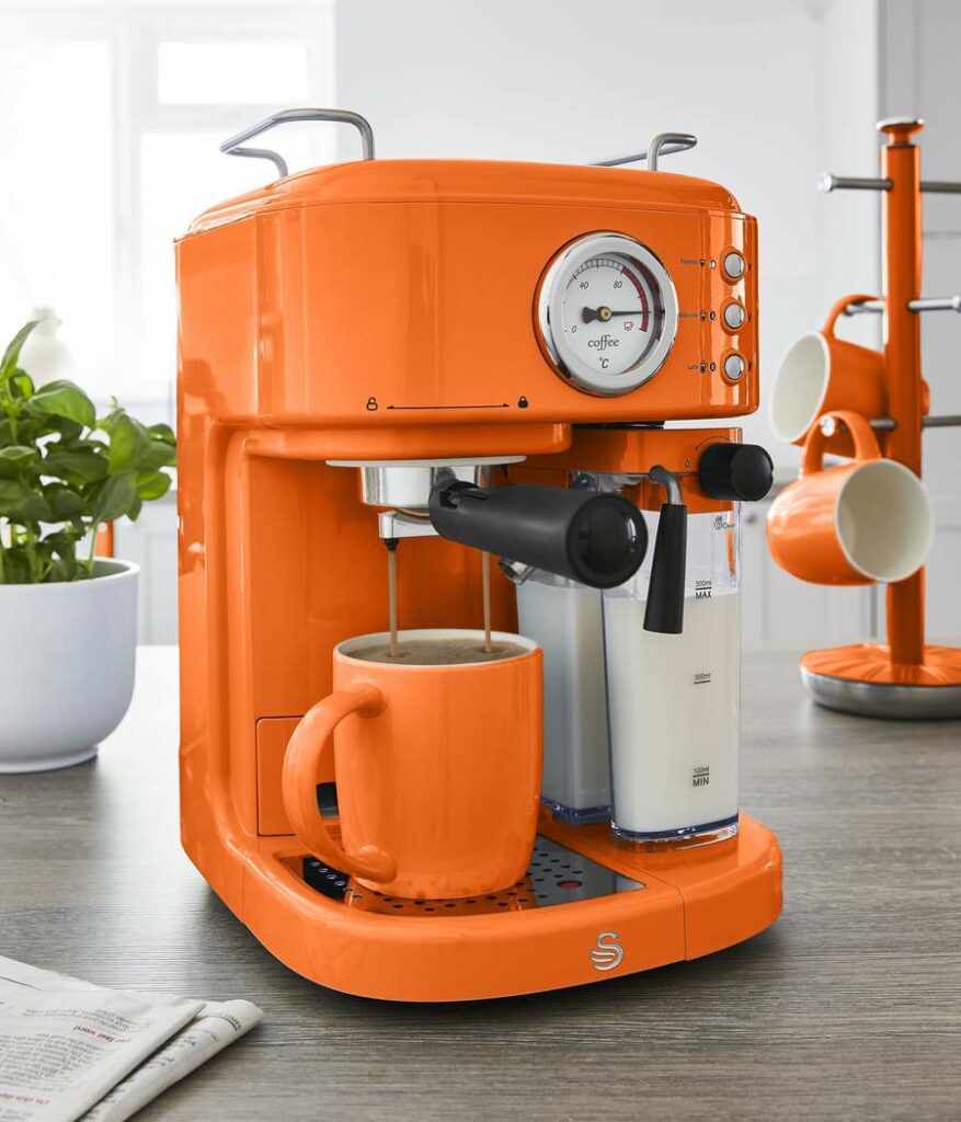 Orange Swan Retro One Touch Espresso Machine on a grey ash kitchen top