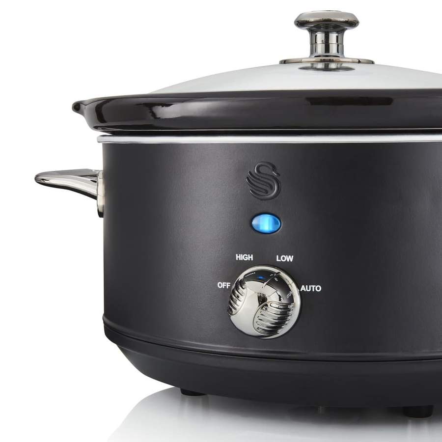 A matte black swan slow cooker against a white background.